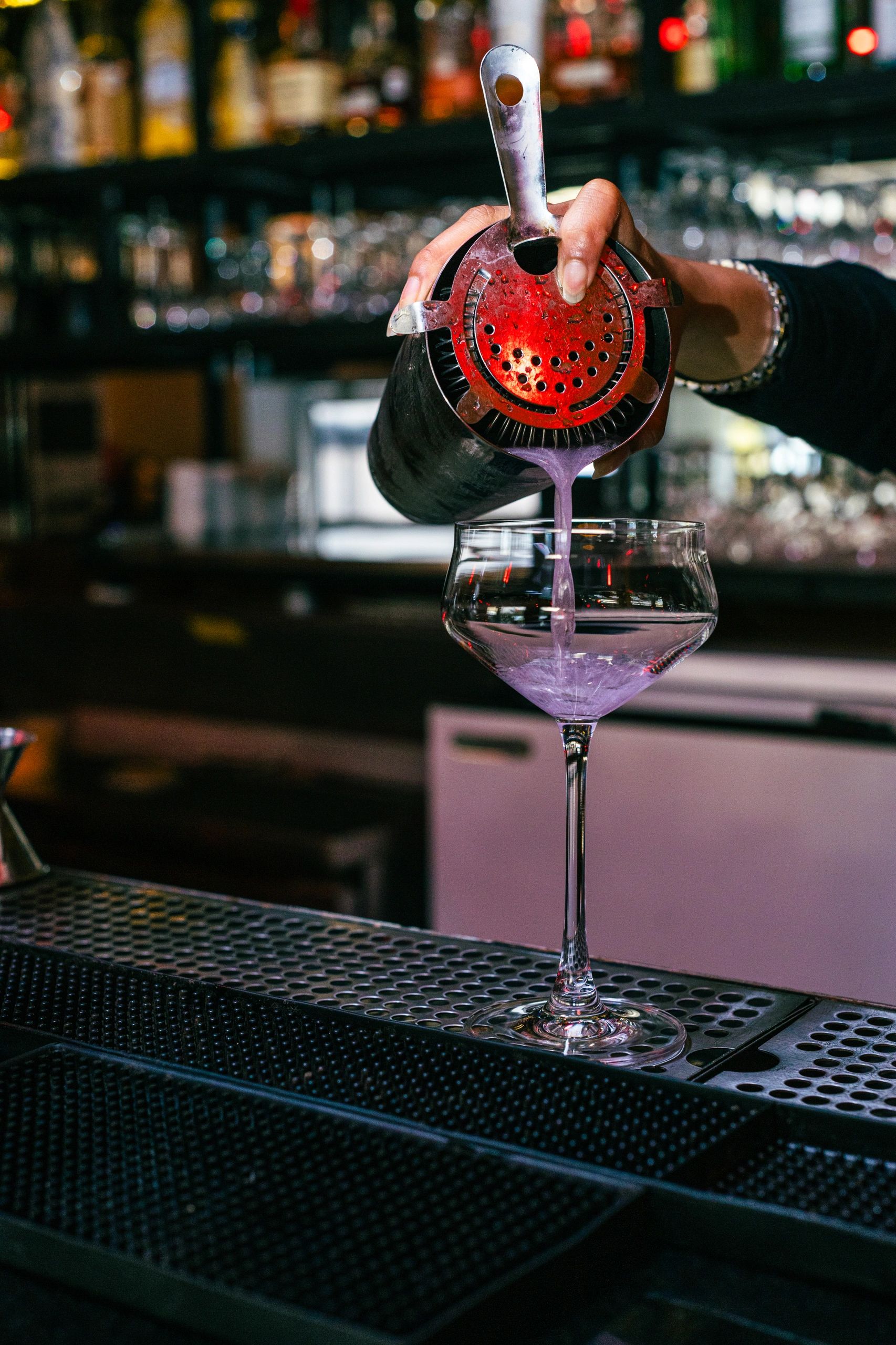 Cocktail being poured at Spinalis Steakhouse bar